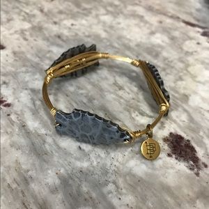 Silver arrowhead Bourbon and bowtie bangle.