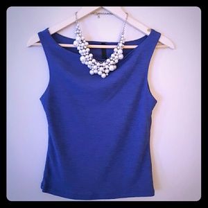 Sleeveless blueish shirt