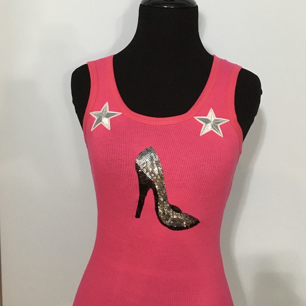 A pink tank top with cute nice designs!!