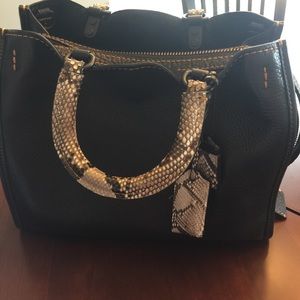 Coach python rogue bag.