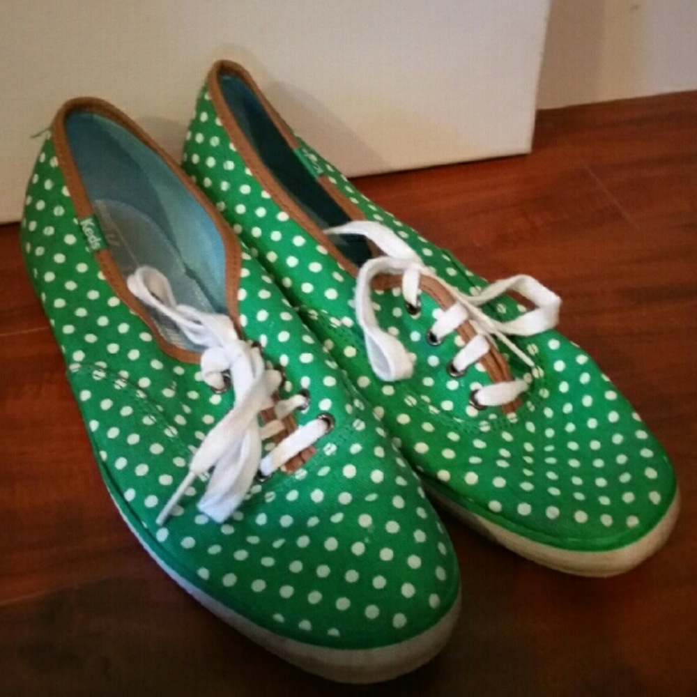 A pair of green polka dot keds in size 9.5