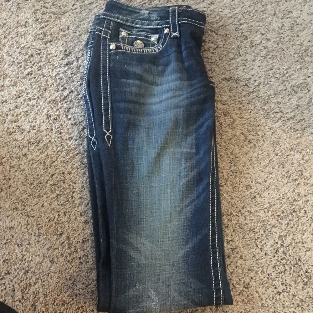 Never worn rock revival jeans!