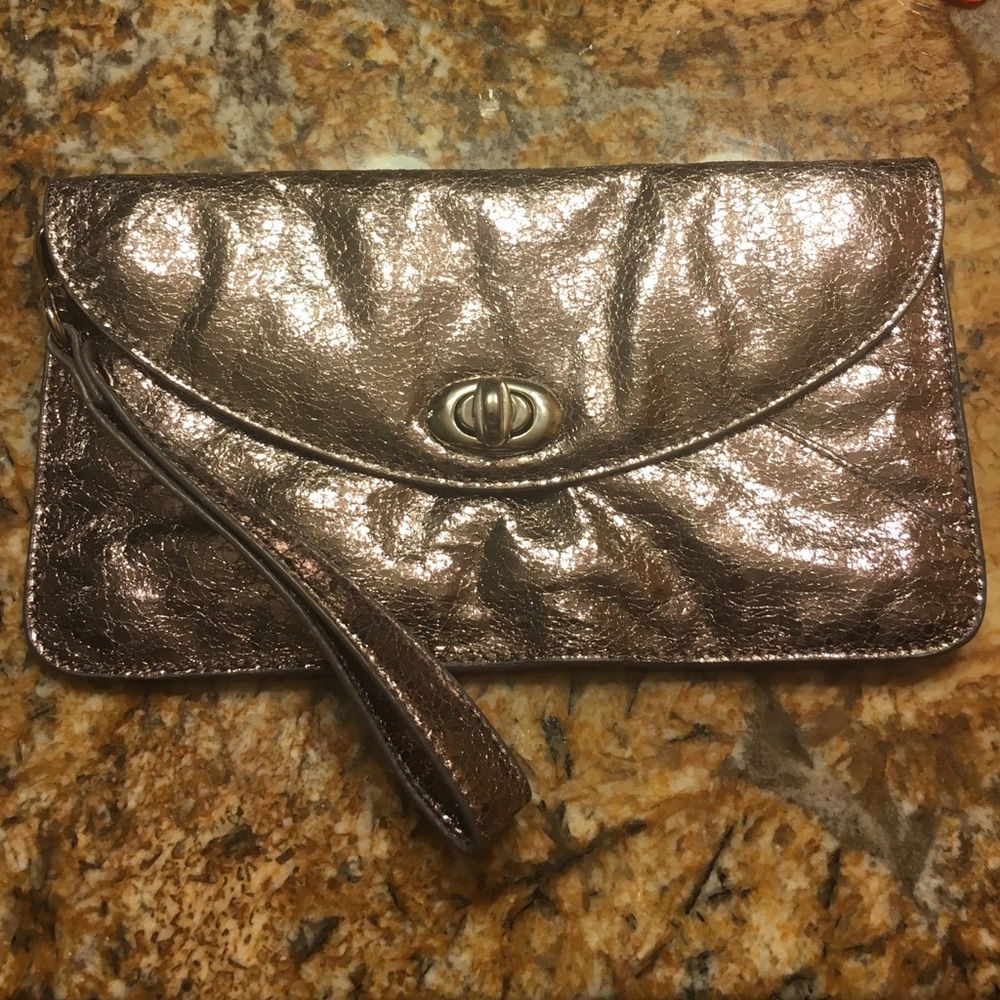 Sorial wristlet/clutch