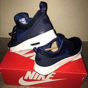 Blue and Black Nikes