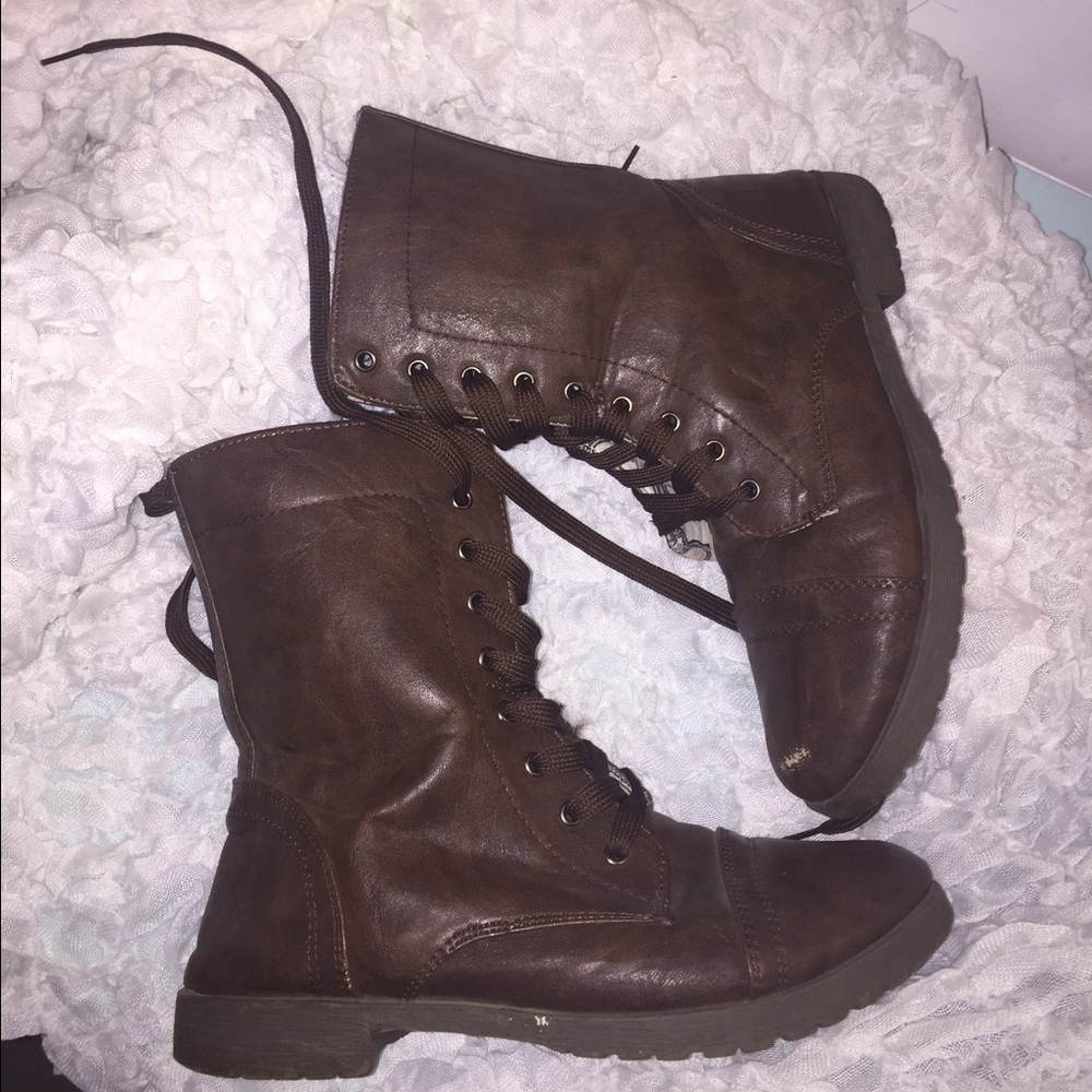 Brown combat boots with floral lining inside!
