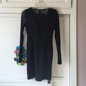 Little black dress with plunging neck line!