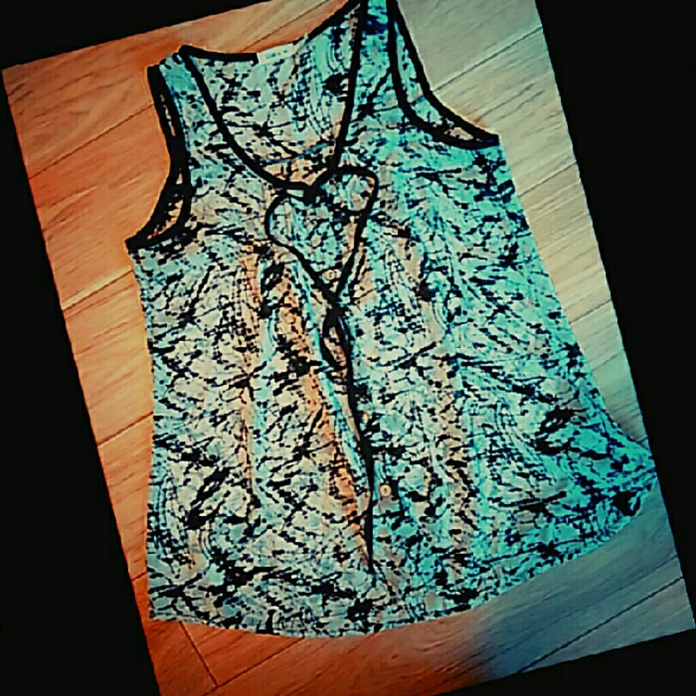 Sheer sleeveless tunic