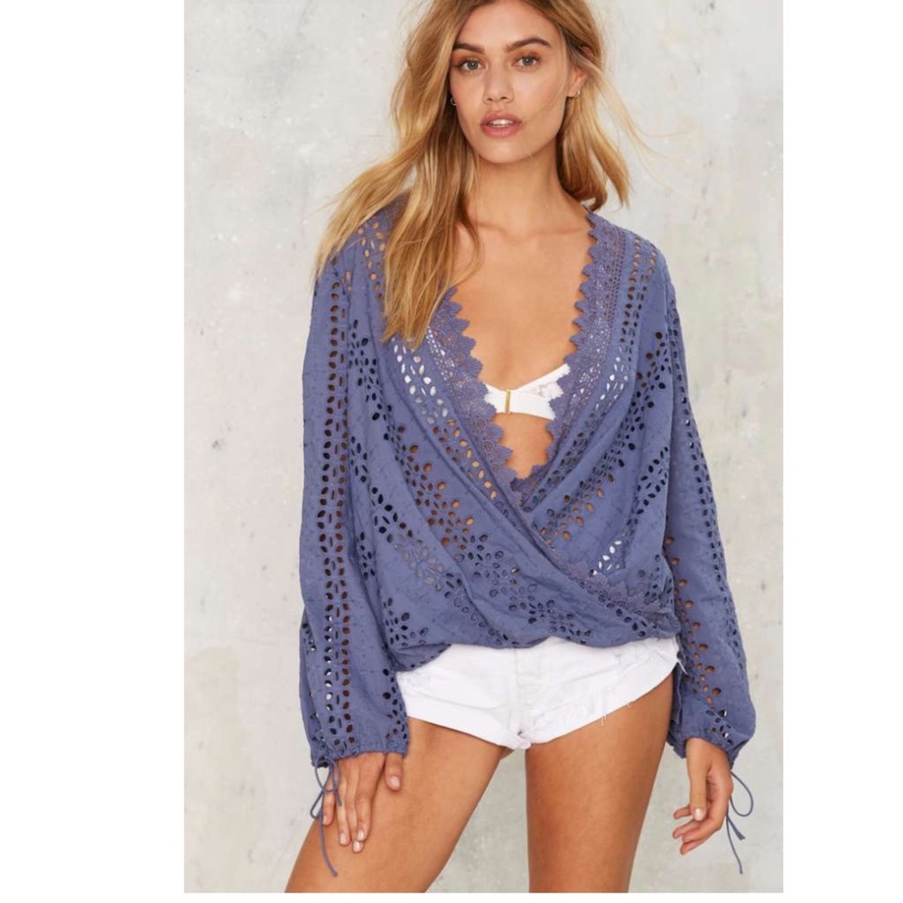 All eyelets on you plunging top