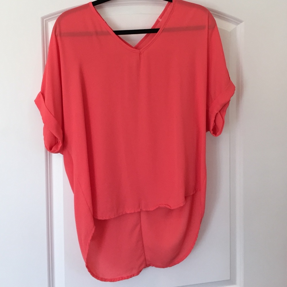 Francesca's peach colored light, flowy top, size M