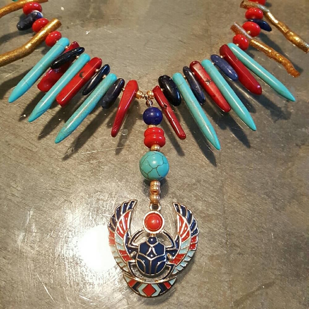 Scarab beetle necklace with coral, blue goldstone