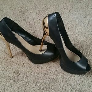 Aldo Black with golden 5 inch heel