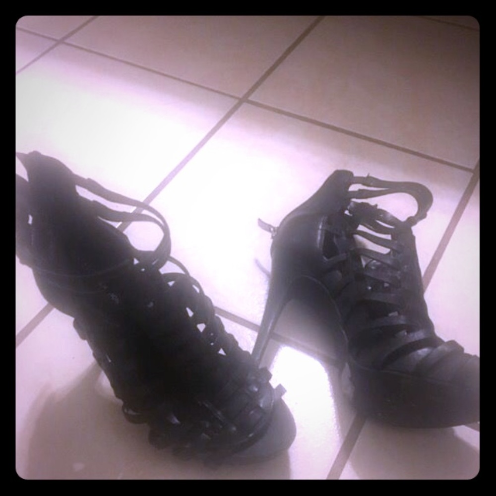 Black caged heeled shoes