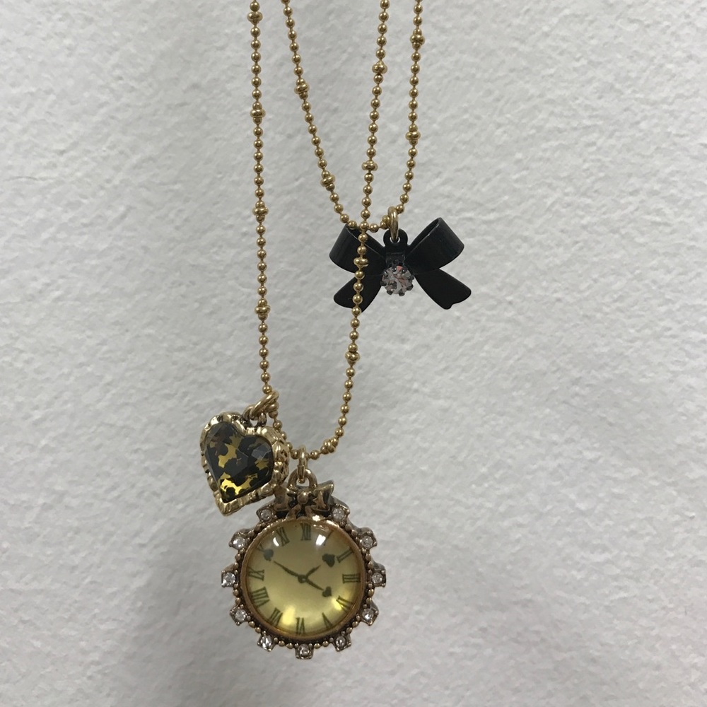 Betsey Johnson gold necklace with charms