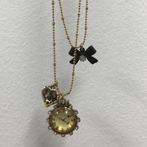 Betsey Johnson gold necklace with charms