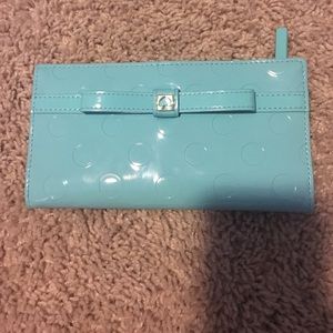 Blue Kate Spade polka dot wallet
