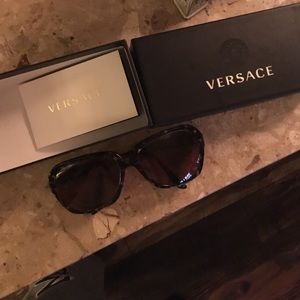 Versace sunglasses need gone