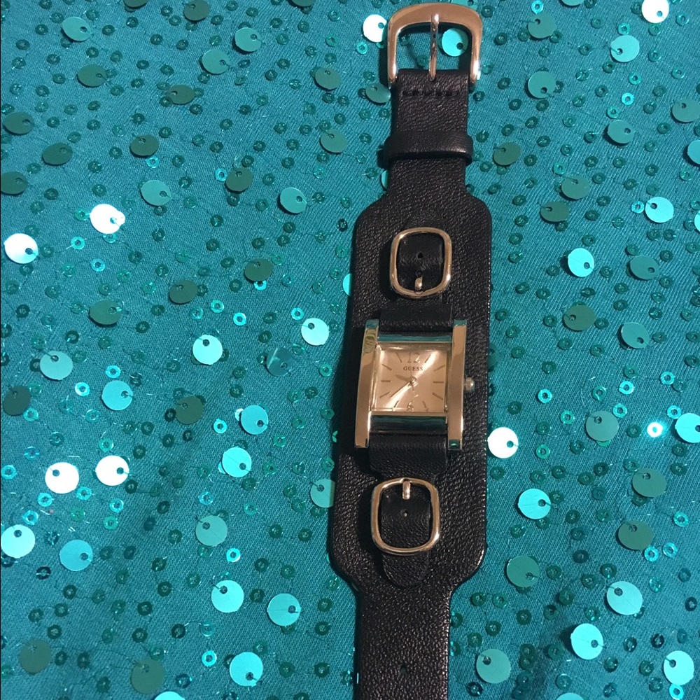 Black leather Guess watch.