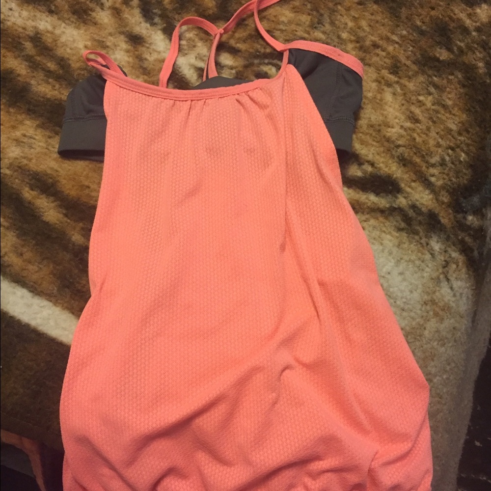 Workout top with built in bra. Worn once.