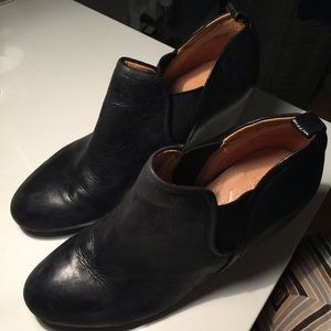 Black wedge booties