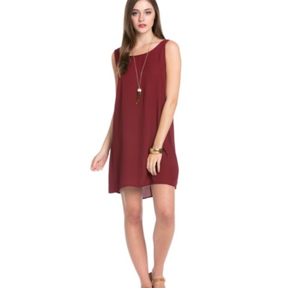 Sleeveless Tunic with a Striped Bow Back. - Picture 3 of 7