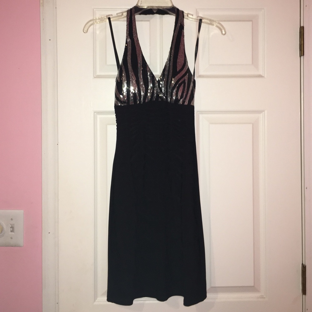 Black dress with zebra stripes in sequence