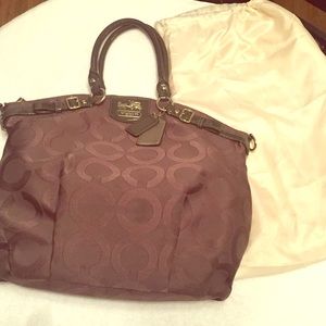 Coach purse. Crossbody. Light purple.