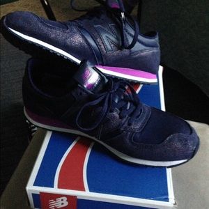 Size 8.5 women's New Balance purple