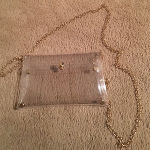 See through clutch/cross body hand bag.