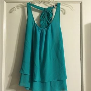 Flirty flowy turquoise top with ruffle racerback