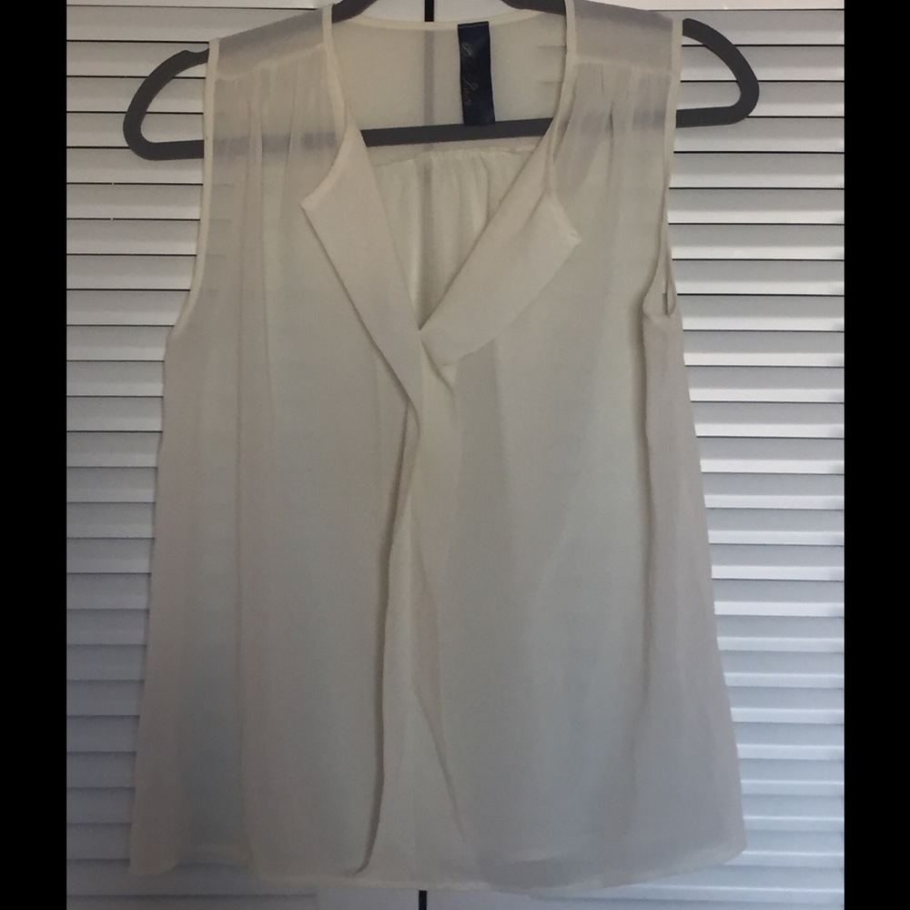 Pretty sheer off white sleeveless top.