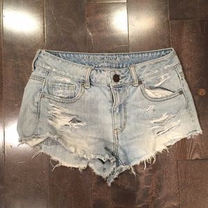 High waisted distressed jean shorts