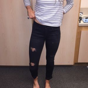 lightly distressed black jeans