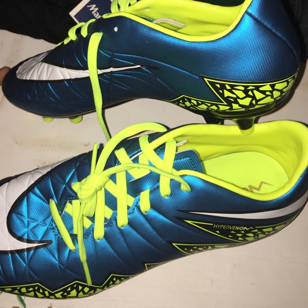 blue and yellow soccer cleats