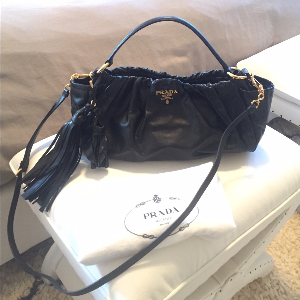Prada top handle bag with cross body strap