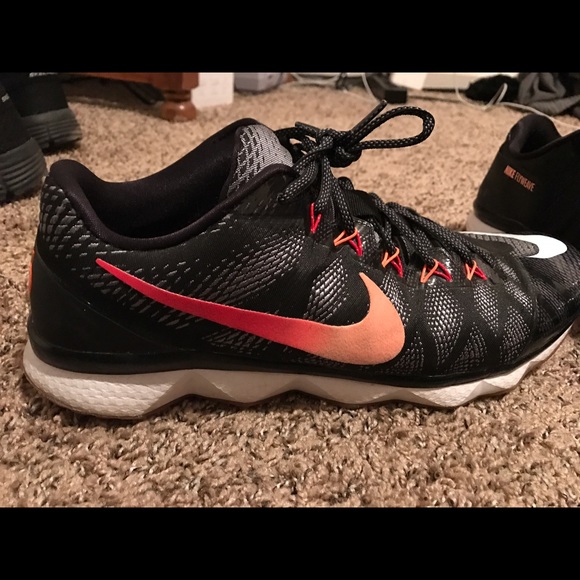 black and peach nike shoes