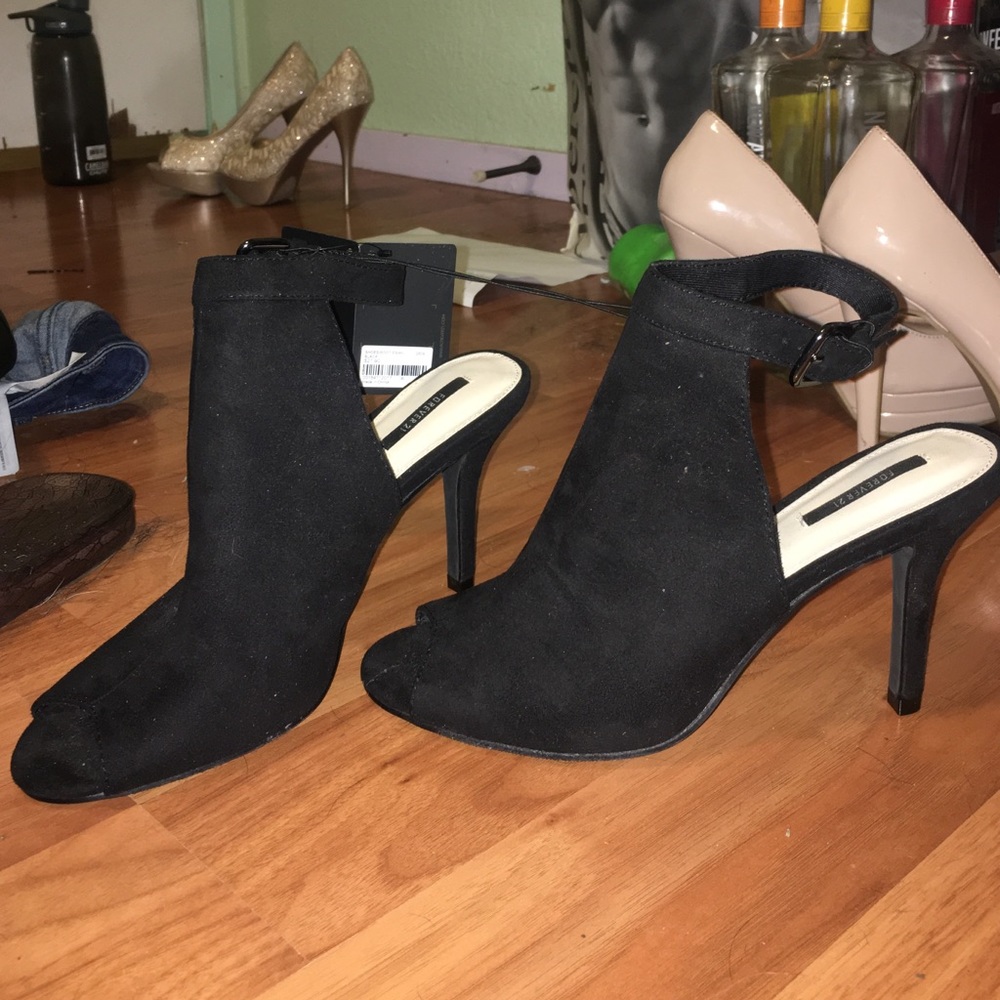 Peep toe black suede heels