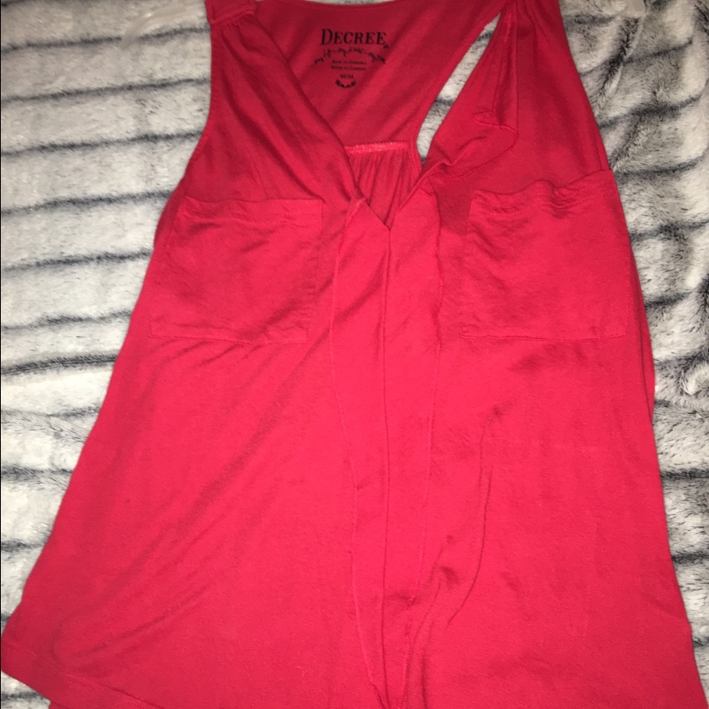 pink V neck top with pockets