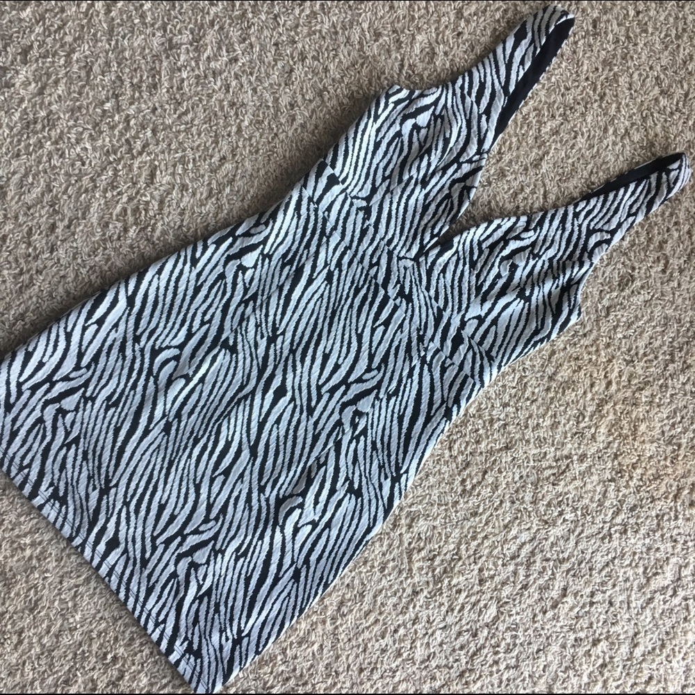 Black/white pattern mini dress with deep v-neck