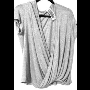 Free people cross over tee