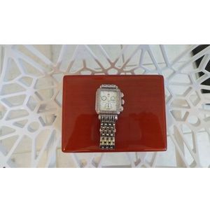 Michele Deco orange diamond bezel watch.