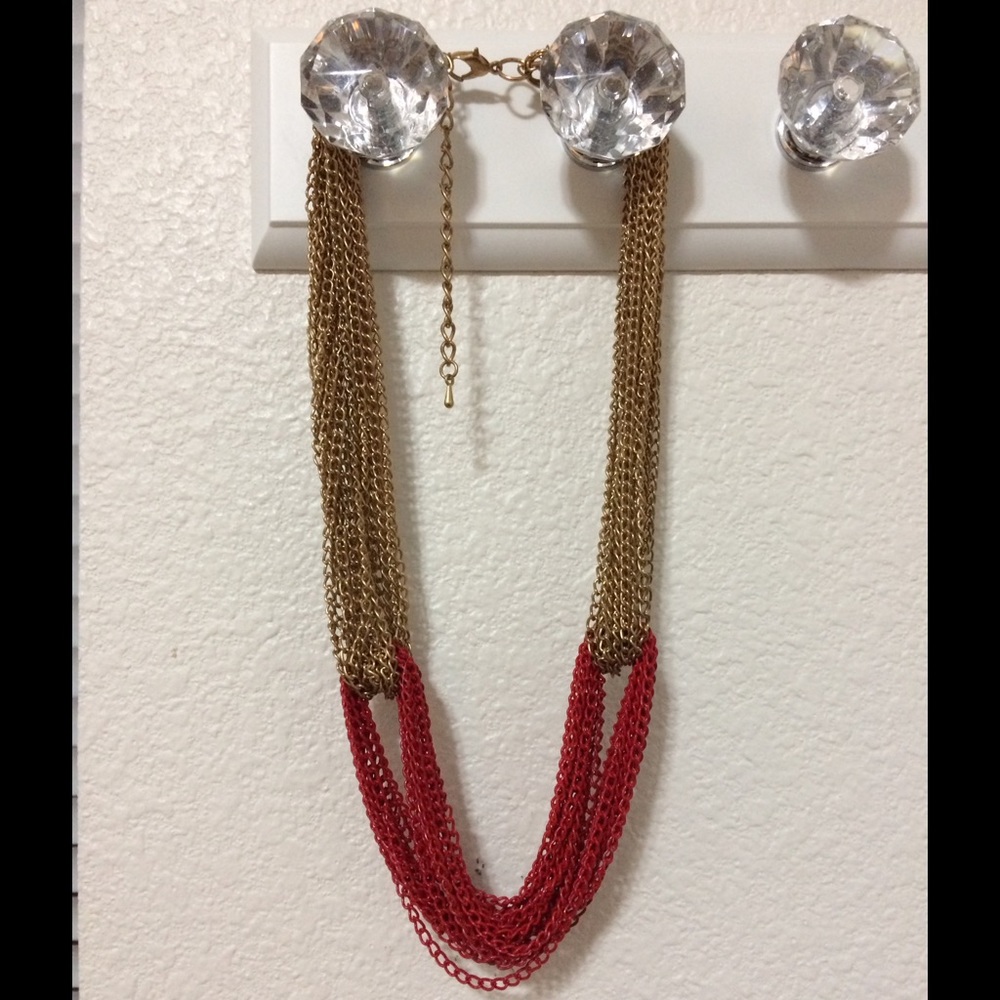 Gold and red chain necklace and pentagram hoops