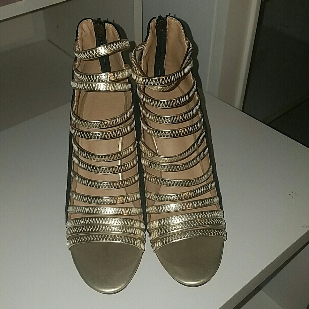 Black & gold gladiator heeled open-toe..red bottom