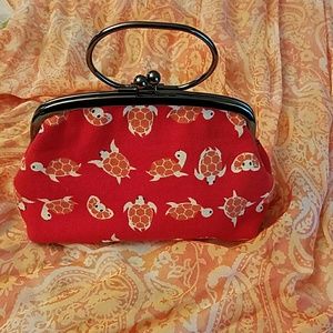 Red coin clutch w/turtle design NWOT