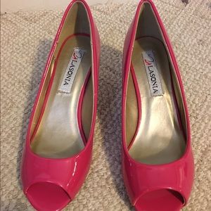Pink open toe pumps