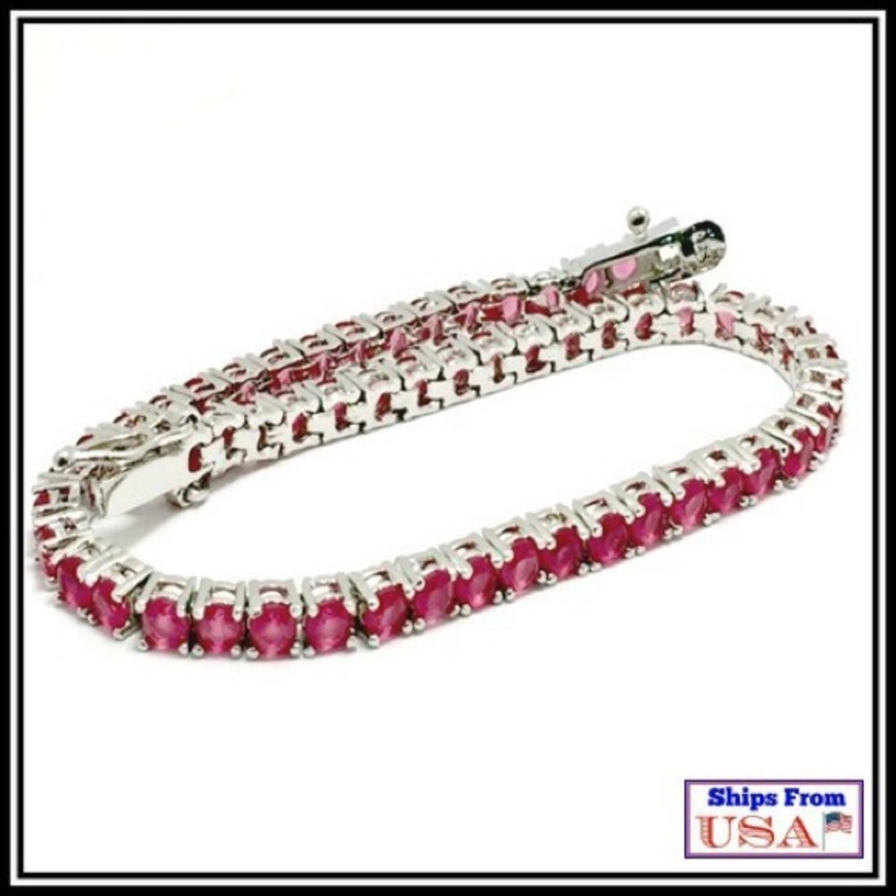 .925 Sterling silver and Ruby tennis bracelet.