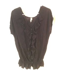 Free People black ruffled short sleeve top.