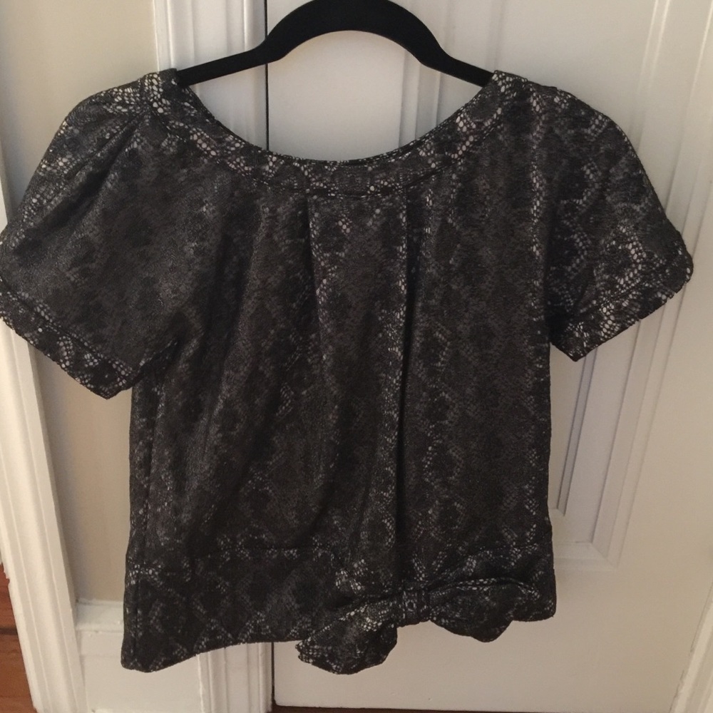 Marc Jacobs black lace top with nude lining.