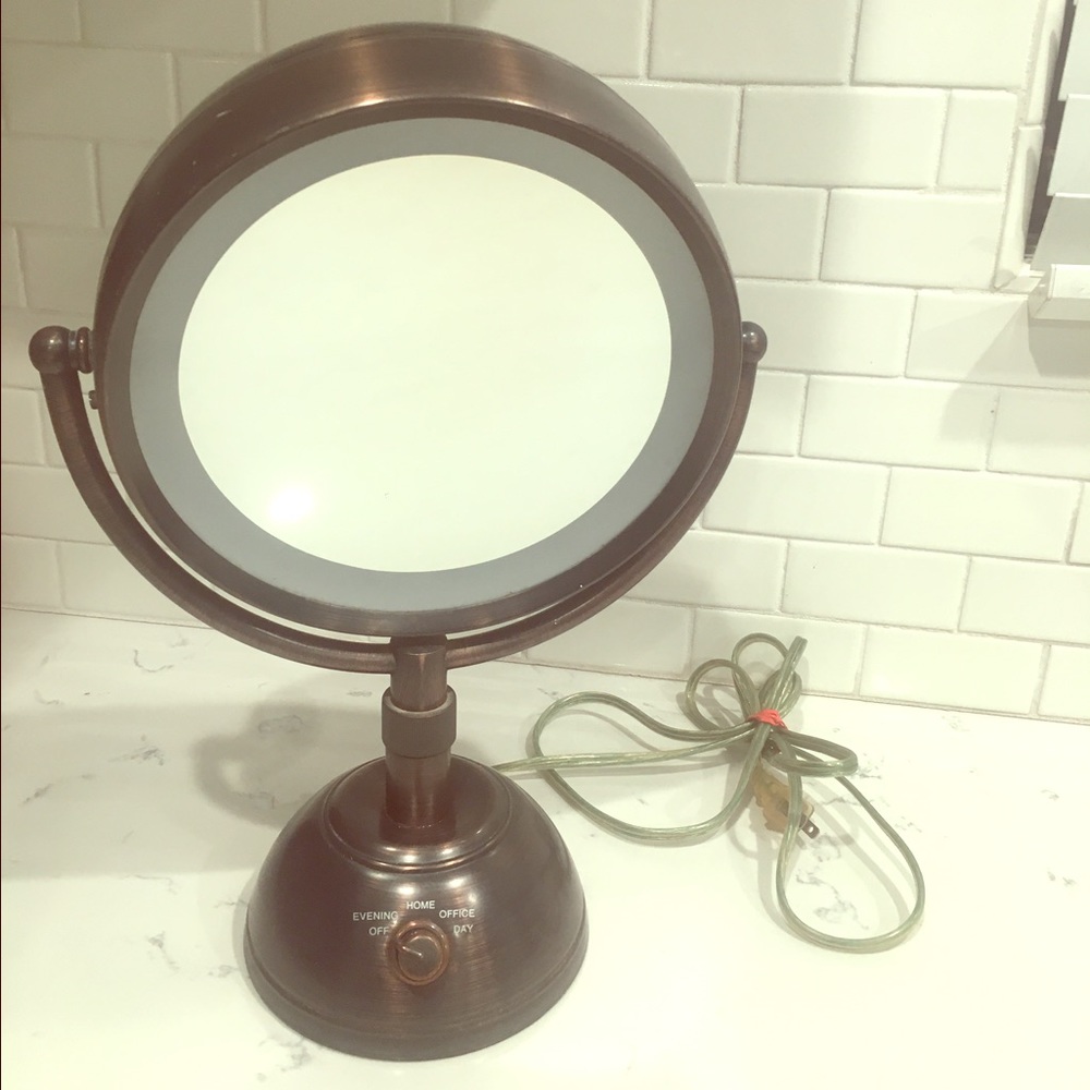 Two-sided, standing, light-up, glam mirror.
