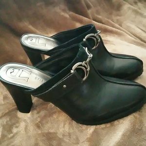 Black heeled boot mules