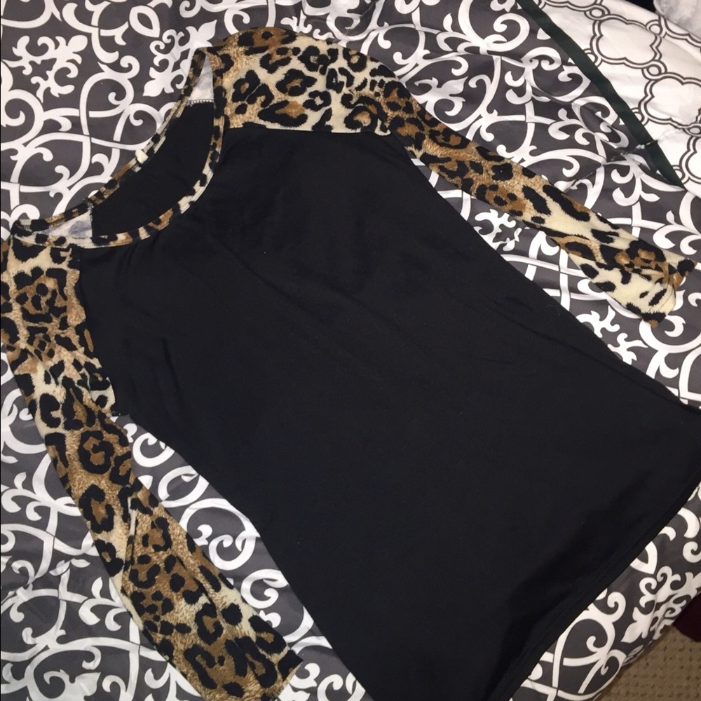 Black leopard print three-quarter sleeve shirt. :)